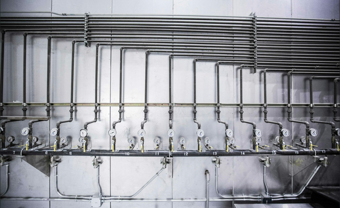 New silver pipes laid out in an organised manner
