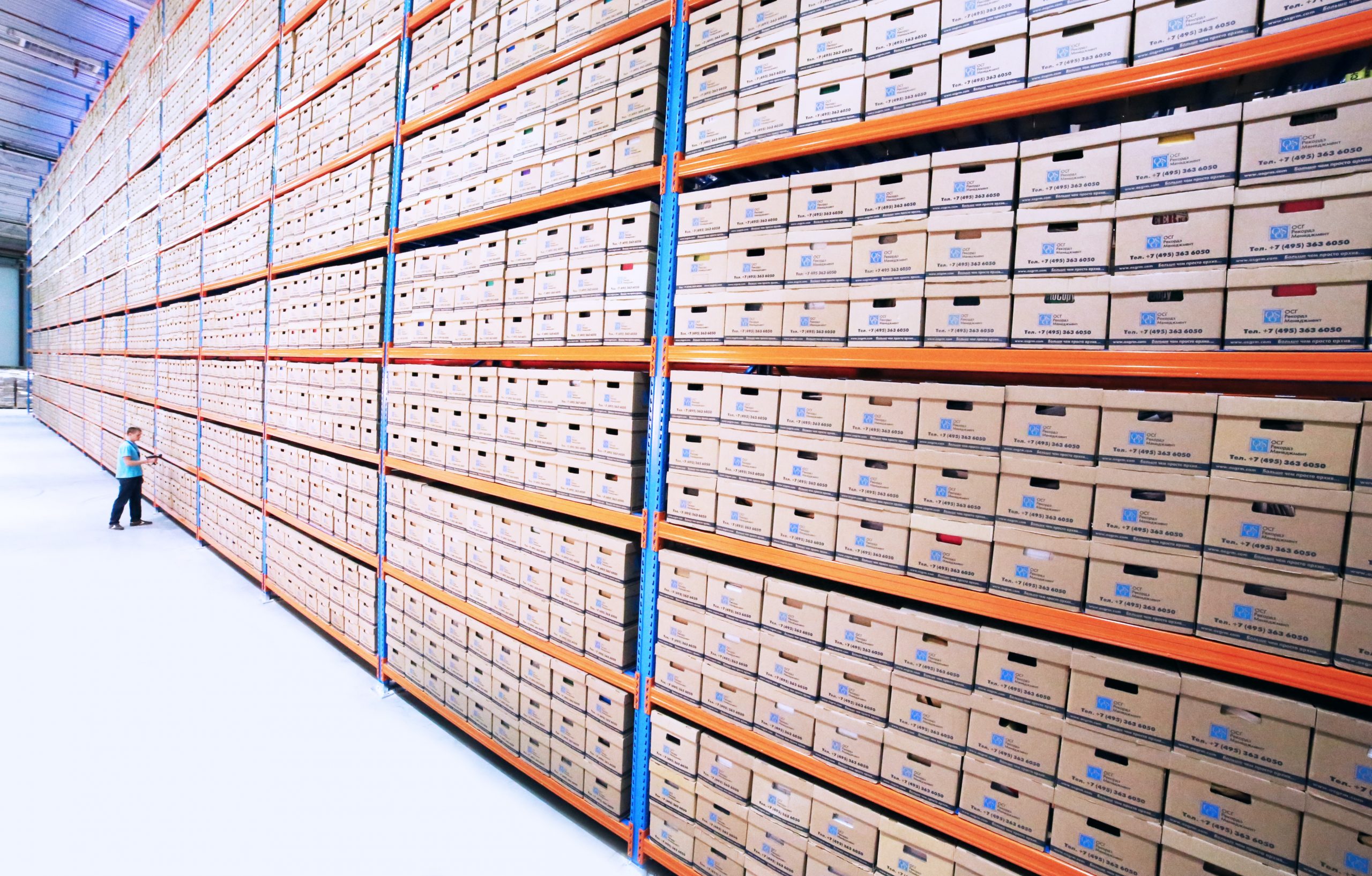 Large industrial shelving with thousands of archive boxes